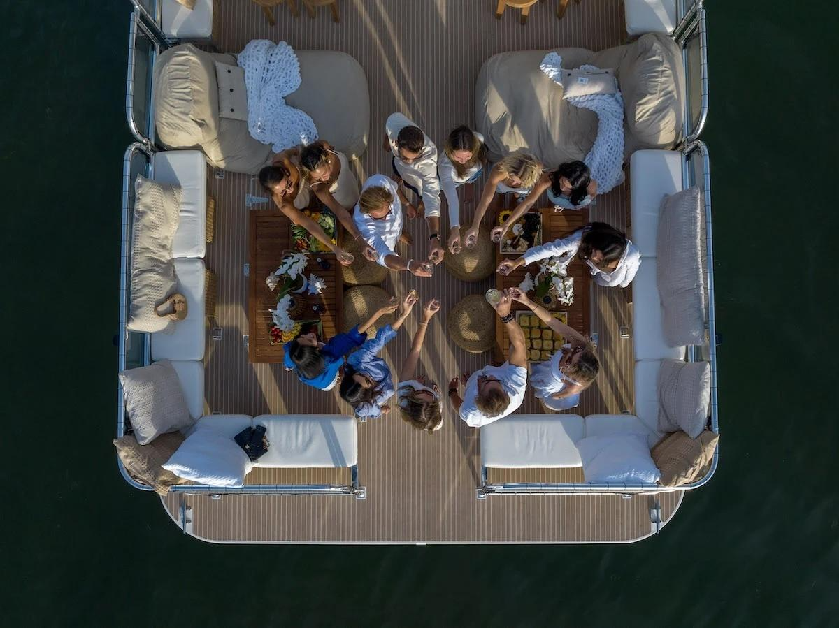 Group celebrating on a yacht