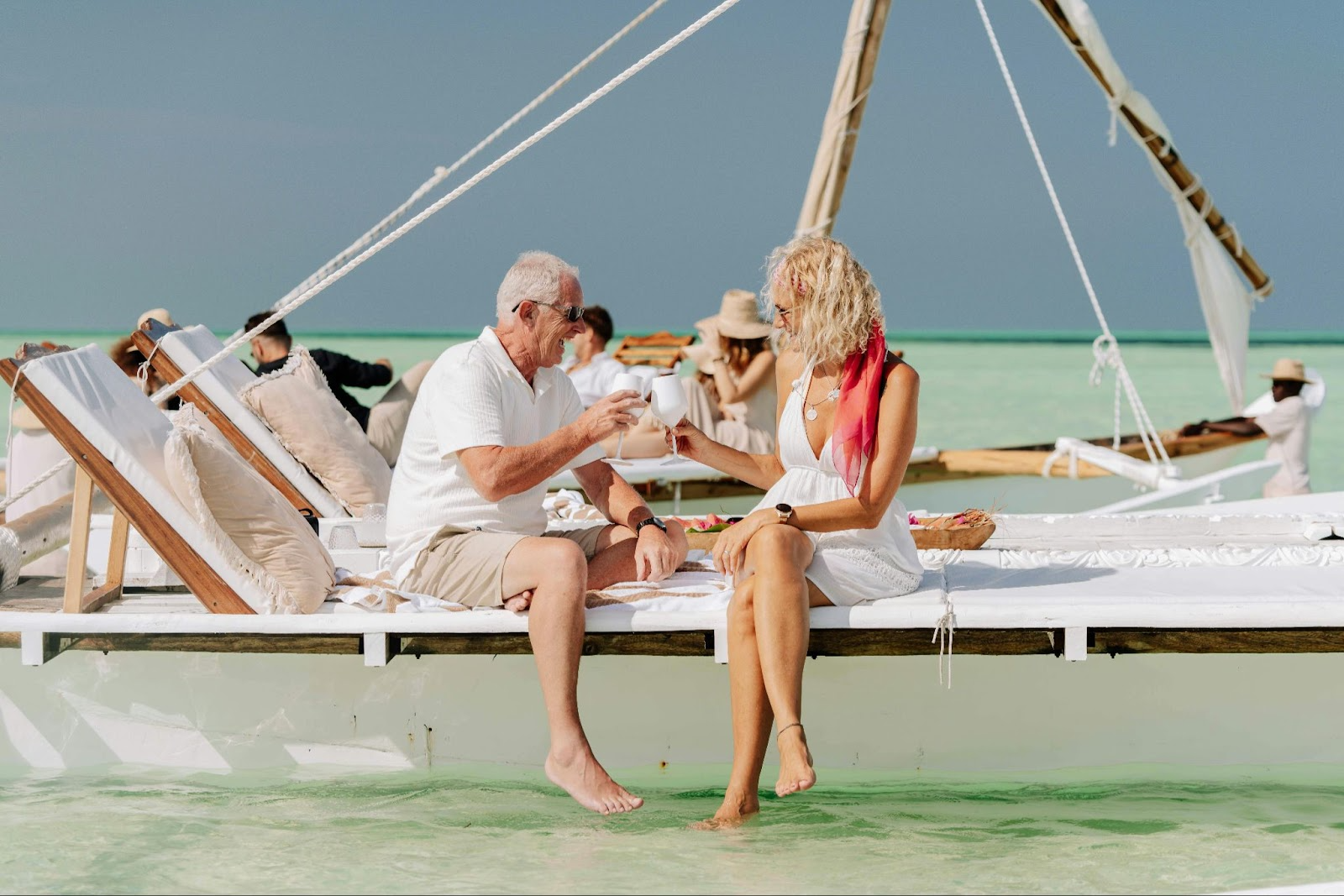 A Couple toasting and having a great time on a boat