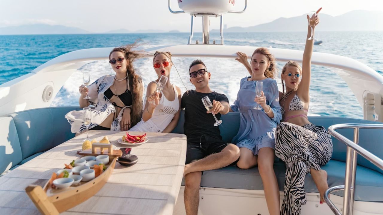 Corporate yacht party with champagne, food, and ocean views. 