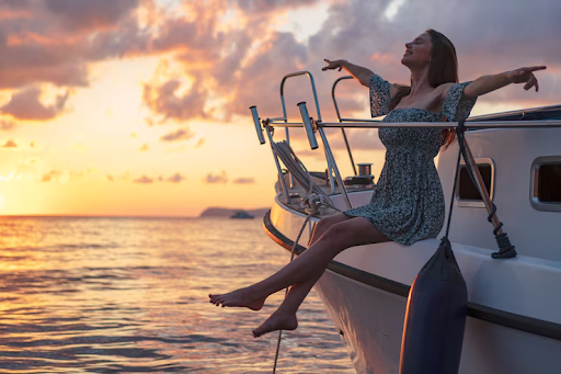Young woman enjoying sunset on a yacht in Delray Beach